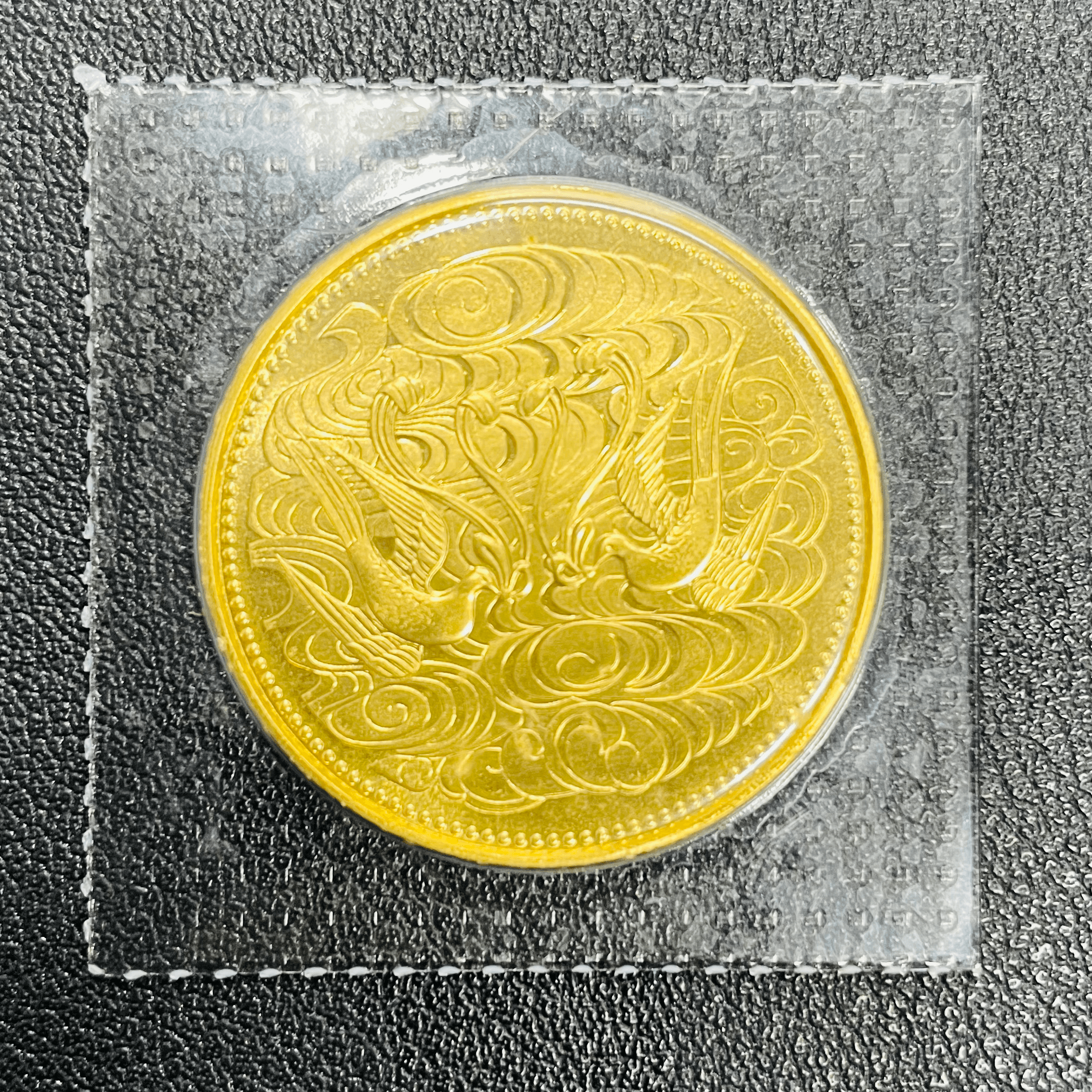 天皇陛下御在位60年記念金貨をお買取させていただきました。